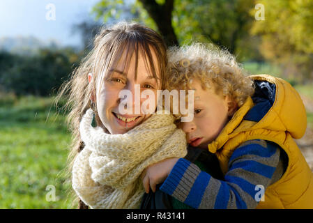 beautiful young woman wearing a pair of boxing gloves Stock Photo