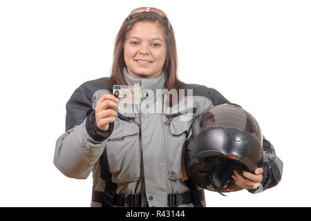 Happy young woman showing proudly her new motorcycle license Stock Photo