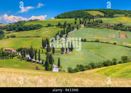 Famous travel and photography destination in Tuscany. Fantastic winding rural road near Monticchiello, Tuscany, Italy, Europe Stock Photo