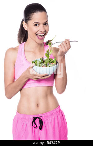 Pretty fit woman having salad Stock Photo