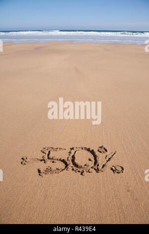 50 percent discount in sand beach Stock Photo