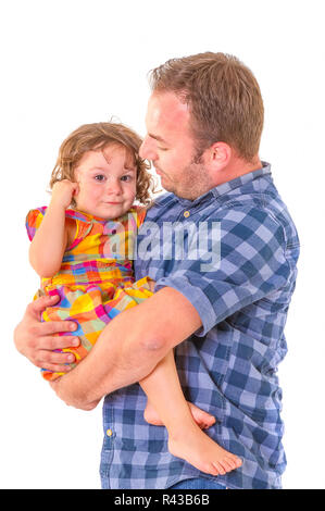Father comforting his crying little daughter. Stock Photo