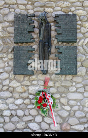 Within the boundary of Dachau Concentration Camp in Germany, viewed here is a memorial to all Polish internees at Dachau. Stock Photo
