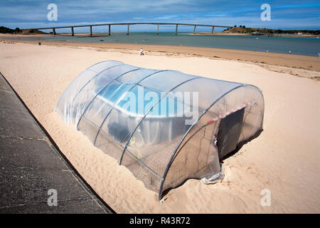 Very small indoor swimming pool on the beach Stock Photo