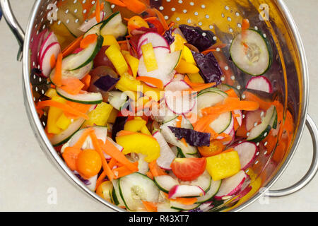 Chopped Salad Vegetables Mix in a Colander Stock Photo