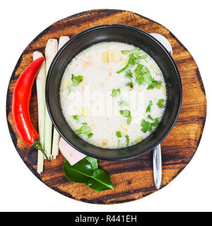 above view of thai soup Tom yam in bowl on board Stock Photo