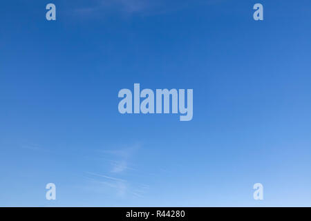Clear blue sky with a little white cloud. plain natural background and good weather Stock Photo