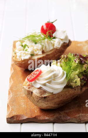 Baked potatoes with cheese Stock Photo
