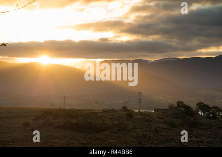 Vibrant Sunset over Lake Jindabyne & Mountains in Australia Stock Photo