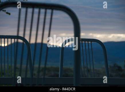 Soft Fluffy clouds near sunset over Lake Jindabyne and the mountains Stock Photo