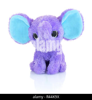 Elephant plushie doll isolated on white background with shadow reflection. Plush stuffed puppet on white backdrop. Purple or violet stuffed elephant t Stock Photo