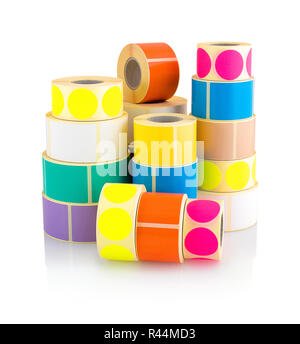 Colored label rolls isolated on white background with shadow reflection. Color reels of labels for printers. Labels for direct thermal or thermal tran Stock Photo