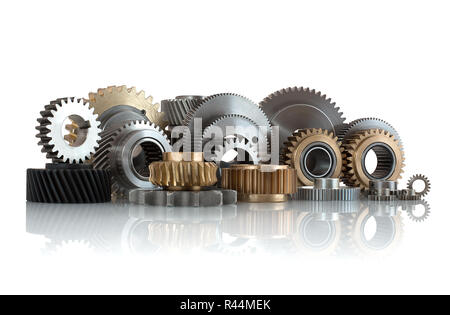 Sets of gears, cogwheels made of steel and brass isolated on white background with shadow reflection. Helical and spur gears,some with bearing isolate Stock Photo