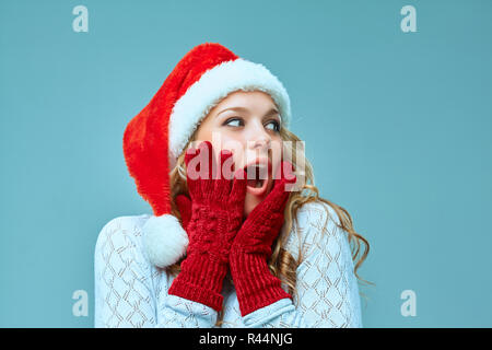 portrait of girl dressed in santa hat Stock Photo