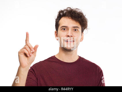 Cheerful smiling young man portrait with good idea Stock Photo