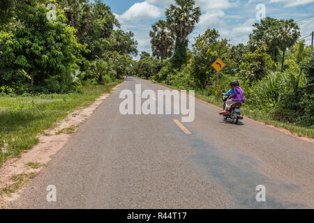 Motorbike in Cambodian countryside in Angkor Archaeological Park, near Siem Reap, Cambodia Stock Photo