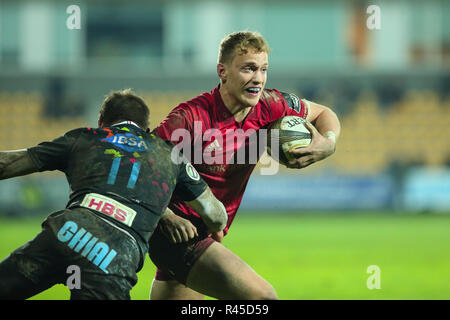 Parma, Italy. 25th November, 2018. Munster's full back Mike Haley breaks a tackle in the match agains Zebre Rugby Club in Guinness PRO14 2018 2019©Massimiliano Carnabuci/Alamy Live news Stock Photo