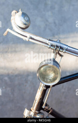 Vintage bicycle handlebars with gray background Stock Photo