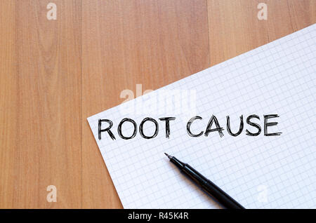 Root cause write on notebook Stock Photo