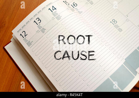 Root cause write on notebook Stock Photo