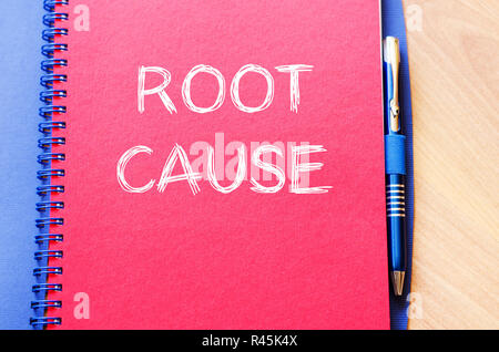 Root cause write on notebook Stock Photo