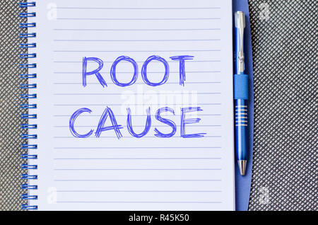 Root cause write on notebook Stock Photo