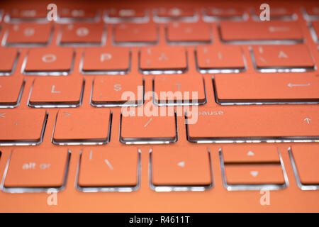 Closeup of laptop keyboard illumination, backlit keyboard Stock Photo