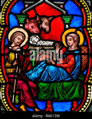 Stained Glass in the Cathedral of Monaco depicting a Nativity Scene at Christmas Stock Photo