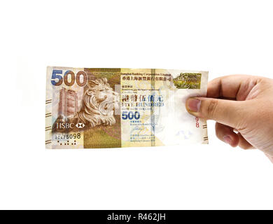 500 Hong Kong dollar in hand isolated on white background. Stock Photo