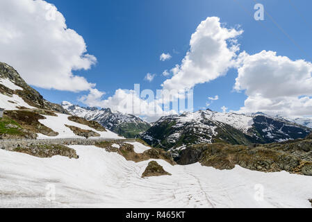 Lots of snow in June near Grimsel mountain pass in Swiss Alps Stock Photo