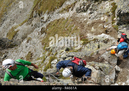 Climbing with a certified mountain guide in Montafon, Austria Stock Photo