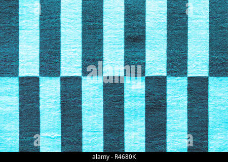 Multi-colored stripes on the fabric. Colorful traditional Peruvian style, close-up rug surface. Stock Photo