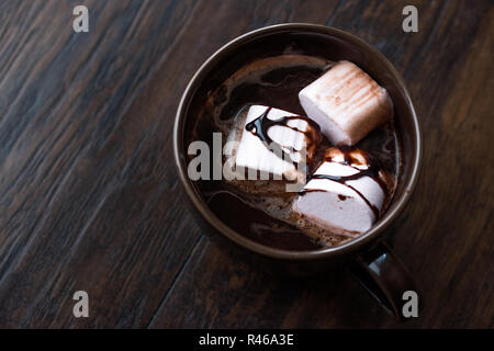 Hot Chocolate with Marshmallow Candies and Sauce. Juicy Dessert. Stock Photo