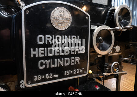 Close up of an original working Heidelberg cylinder printing press at the GRID Grafisch Museum in Groningen, Netherlands. Stock Photo