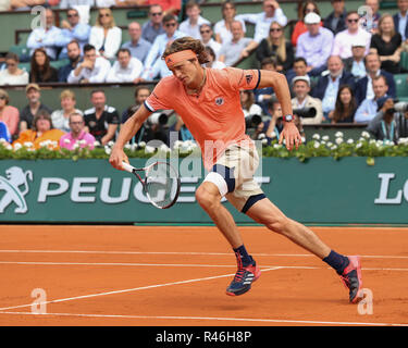German tennis player Alexander Zverev running forward during French Open 2018 tennis tournament, Paris, France Stock Photo