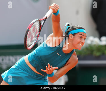 French tennis player Caroline Garcia playing a service shot at the  French Open 2018, Paris, France Stock Photo