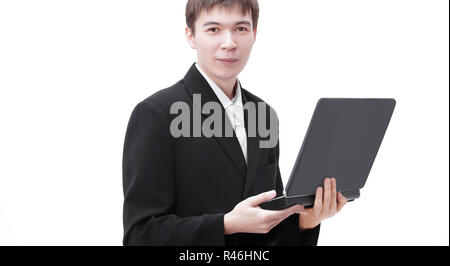successful young businessman holding a laptop open Stock Photo
