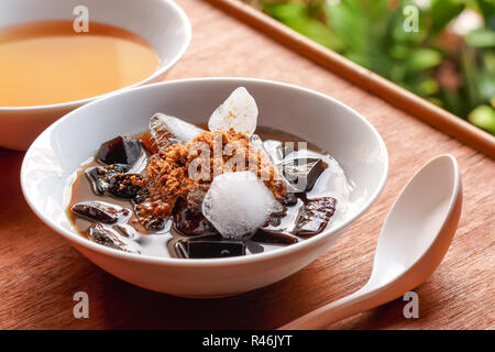 grass jelly dessert, herbal gelatin, Chinese style. Stock Photo