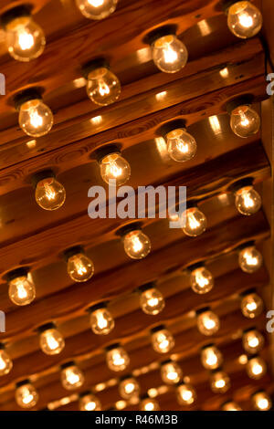 Plenty light bulbs shining bright Stock Photo