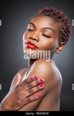 Black beauty with short spiky hair Stock Photo