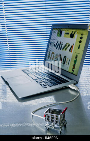 Concept of online shopping via computer. Stock Photo
