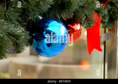 New Year&#39 s spheres on fir-tree branches Stock Photo