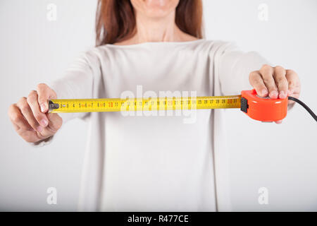 woman with measure tape Stock Photo