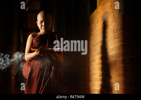 Buddhist novices learning Stock Photo