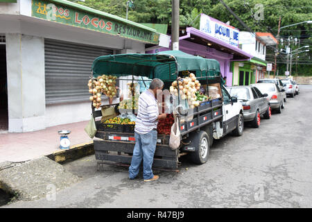 Street vendor selling fruit in Quepos, Costa Rica Stock Photo