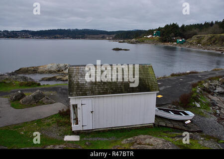 Boat shed and boat at Fisgard lighthouse in Esquimalt B.C. Canada Stock Photo