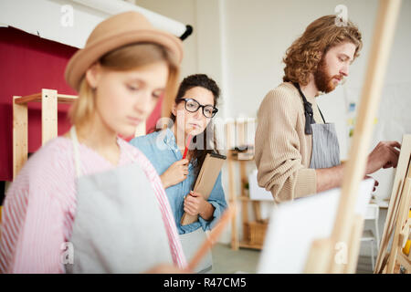 Teacher of painting Stock Photo