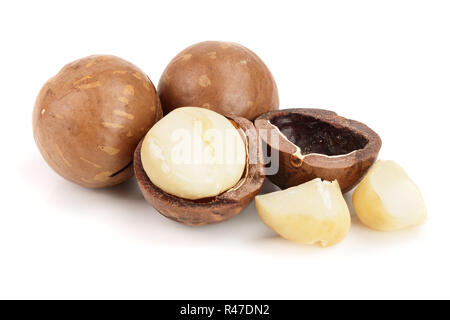 Shelled and unshelled macadamia nuts isolated on white background Stock Photo