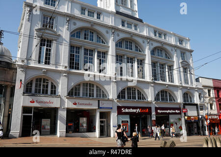 The frontage Star and Telegraph building on High Street, Sheffield city centre England, now Sainsbury's and Santander bank Iconic listed building Stock Photo