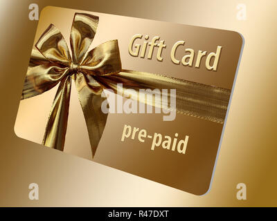 A pre-paid gift card is seen here. It is gold with a gold ribbon design on the front. Stock Photo